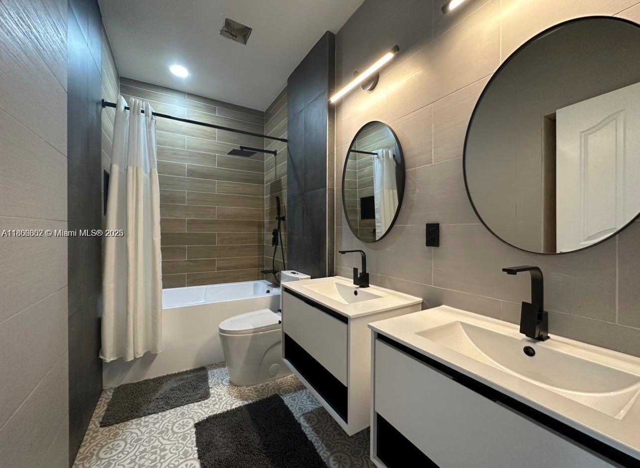 Stylish and updated townhouse in the heart of Doral! This 3-bedroom, 2.5-bath residence showcases an open-concept layout with a sleek modern kitchen and tastefully renovated bathrooms. Generously sized bedrooms ensure comfort, while the private patio offers the perfect setting for both relaxation and entertaining. A spacious 2-car garage provides added convenience and storage. Nestled in a gated community, the property delivers security, privacy, and peace of mind—all just minutes from top-rated schools, parks, and everyday conveniences. Meticulously maintained and truly move-in ready, this home is a must-see. Schedule your showing today!