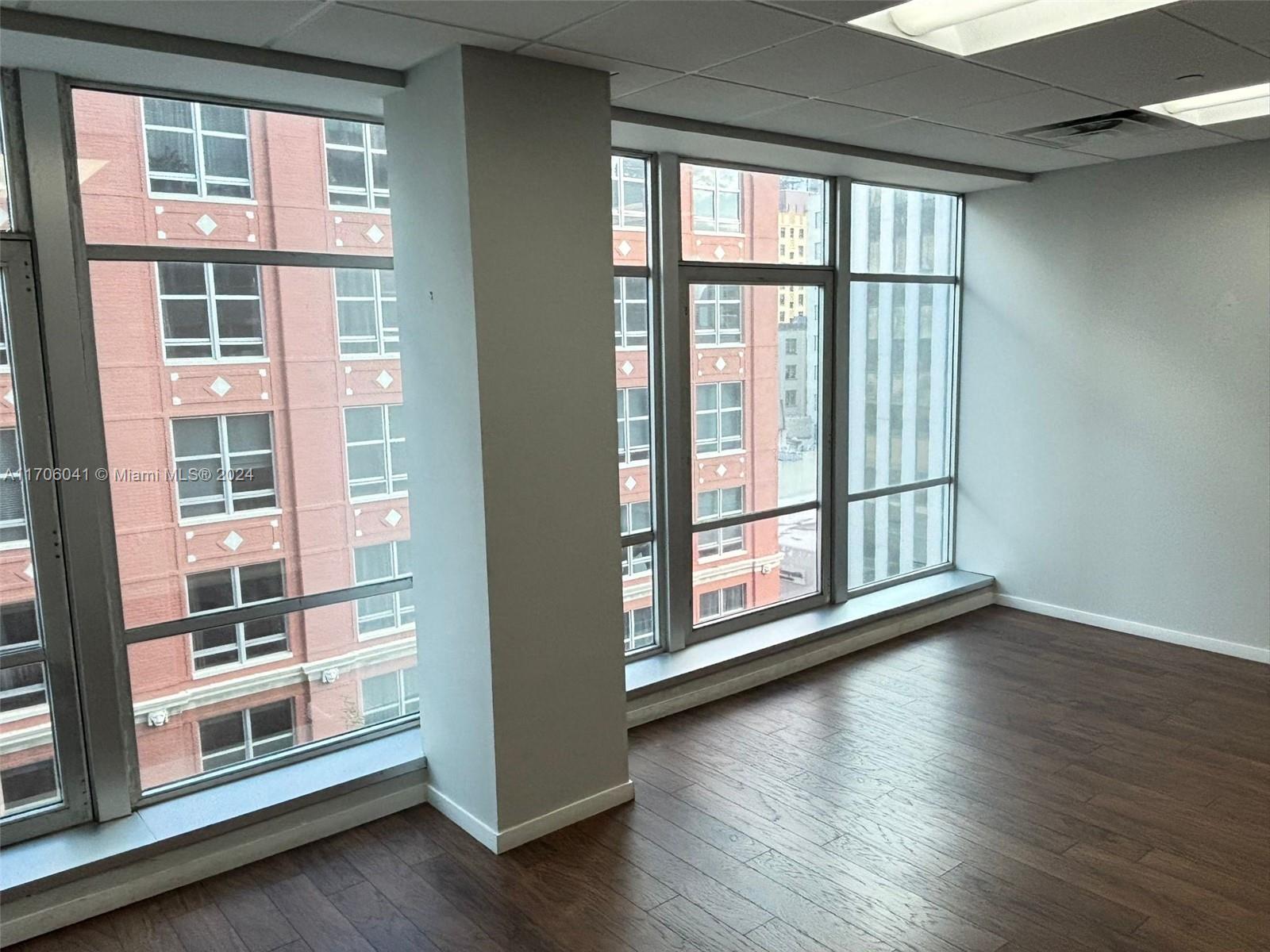 Modern and bright 705 SqFt office in the iconic One Flagler building in Downtown Miami. Designed by renowned architect Morris Lapidus, this office features floor-to-ceiling windows, wood-style flooring, and abundant natural light. The building offers 24/7 security, a front desk, valet parking, and onsite management. Tenants enjoy access to conference rooms and a recently renovated lobby with state-of-the-art connectivity. Conveniently located one block from the courthouse, walking distance to Biscayne Blvd, Whole Foods, and Metro Mover stations. A perfect space for entrepreneurs and small businesses.