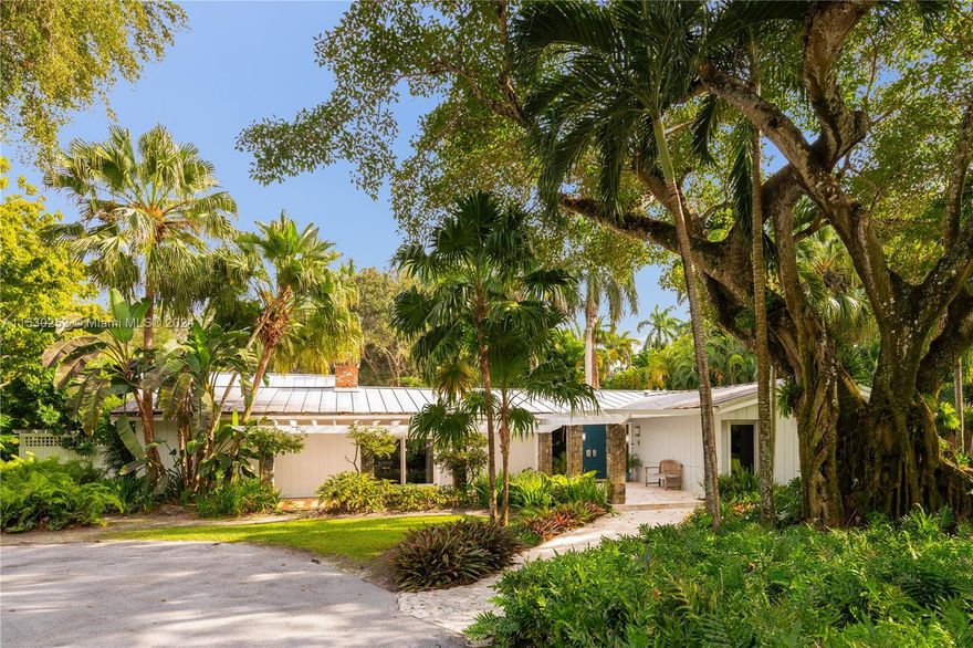 Welcome to 5600 Kerwood Oaks Drive, a prestigious property located in the private gated enclave of Banyan Drive in Coral Gables. This exceptional property presents an unparalleled opportunity to build the home of your dreams on a highly coveted 35,000 sf lot or to reimagine and reinvent the existing residence. The lush gardens and pool are magical and offer a private oasis for relaxation or entertaining. Nestled close to top public and private schools, this home is surrounded by high-end luxury estates. Don't miss this remarkable opportunity to create your ideal living space in one of the most sought-after locations in Coral Gables. Whether you envision a complete reinvention or building your dream home, this property offers the perfect canvas for your vision. A Very Special Home.