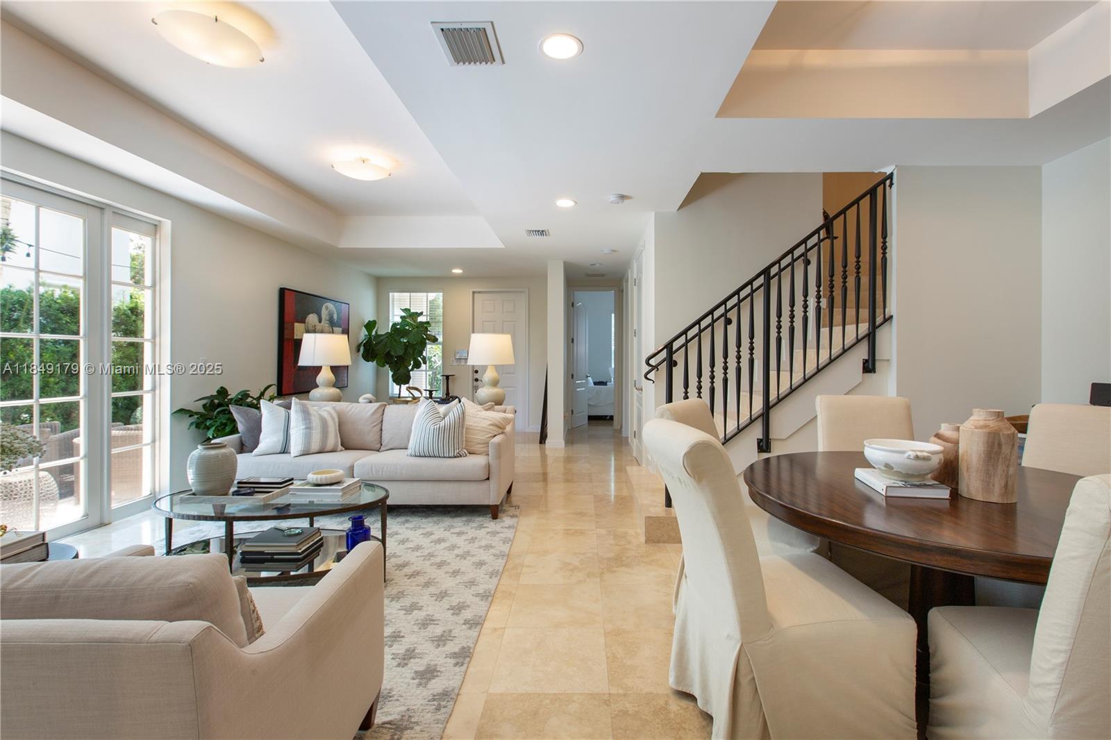 Fabulous corner townhome in the gated Pine Manor community of South Miami. Highly desirable C model with 4 BR/4 BA. Bright and spacious 2-story layout featuring high ceilings, impact windows and doors, and a private patio off the living room. Expansive primary suite includes a private terrace, den or office, and his & hers walk-in closets. Two ensuite bedrooms upstairs, plus one additional bedroom on the main level. Chef’s kitchen with gas range and granite countertops. Elegant marble floors throughout. 4-car carport. Beautifully maintained community with pool. Just steps from South Miami’s best shopping and top-rated private and public schools. Located in Sunset Elementary school district.