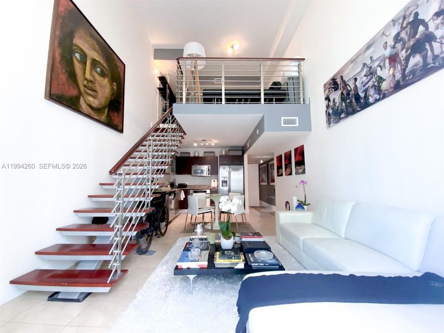 UNFURNISHED. Experience elevated urban living in this spacious 1-bedroom, 1.5-bath loft at Brickell on the River South Tower. This bright two-level residence features floor-to-ceiling impact windows, filling the space with natural light and showcasing the open layout.

The modern kitchen is equipped with stainless steel appliances and granite countertops, seamlessly flowing into the living area—ideal for both everyday living and entertaining. Upstairs, the private suite offers an ensuite bath, walk-in closet, and added privacy. The unit also includes an in-unit washer and dryer for convenience.
Residents enjoy resort-style amenities including a fitness center, pool, spa, clubroom, valet service, 24-hour concierge, and secured access. Assigned garage parking is included.

Ideally located just steps from Brickell City Centre, award-winning dining (including a Michelin-starred restaurant within the building), vibrant nightlife, shopping, and major office hubs—this residence offers the perfect blend of comfort, convenience, and city living.