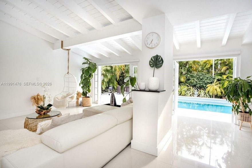 Situated on an 8,100 sq ft lot, Located at a quiet residential street in the historic district of Coral Gables, this charming home at 1418 Cordova St offers the perfect blend of character, comfort, and convenience. Just a few blocks from the Granada Golf Course and near a beautiful neighborhood park, the location is highly desirable, walkable, and close to top fitness centers, shops, cafés, and restaurants.

The home features high vaulted ceilings, French doors throughout, and abundant natural light, creating a bright and inviting atmosphere. Elegant Marble floors run throughout the interior. A flexible office/studio space can easily function as a third bedroom, ideal for guests or working from home. The garage/studio includes an oversized closet and additional storage space. Indoor laundry included. Bathrooms are fully renovated. 
Enjoy a spacious, freshly landscaped garden with mature trees providing privacy, along with a fire pit, hammock, and grill area—perfect for relaxing or entertaining. A mature avocado tree produces generously throughout much of the year. The pool area features built-in speakers for outdoor enjoyment.
Additional highlights include a whole-house filtered alkaline water system and a large safe for added security.