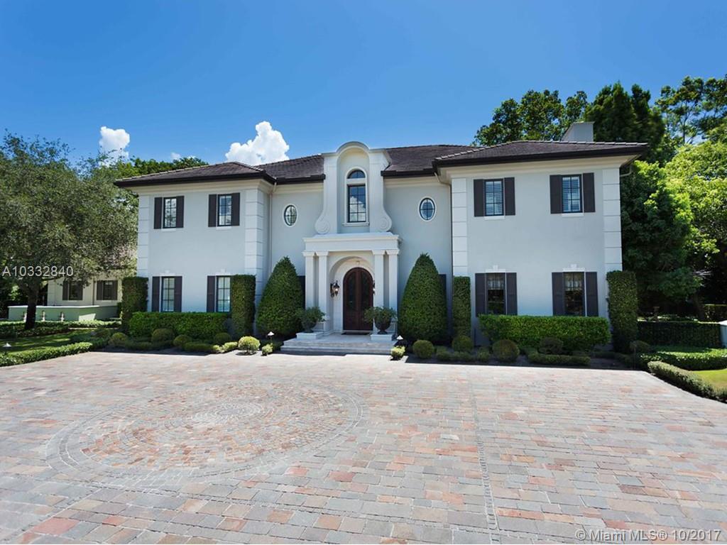 REDUCED AND PRICD TO SELL!! STUNNING ESTATE HOME IN EXCLUSIVE GATED COMMUNITY! Set on a corner lot in the exclusive and guard-gated community of Snapper Creek Lakes, this magazine-quality property boasts 6 bedrooms, each with en-suite baths, chef’s kitchen, a Ritz-Carlton inspired grand living area with over $1M of custom wood paneling, artist murals, wine cellar, bar, generator, elevator, library, study with one of 2 fireplaces, custom lighting, surround-sound audio, mosquito repellant misting system, mosaic-tiled pool, spa, summer kitchen…. and an oasis exterior designed for entertaining. This guard-gated community also offers a private marina & is surrounded by some of the top private & public schools in all of Miami.