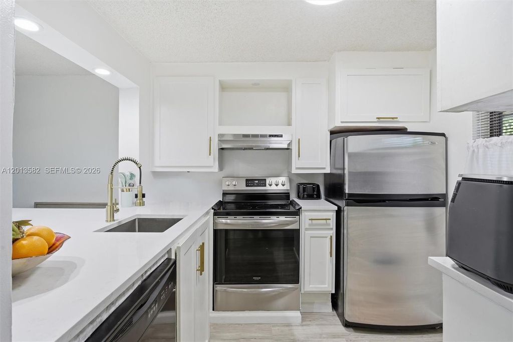 Photo of 5501 Lakeside Dr #204, Margate, FL 33063 (MLS # A12013582)