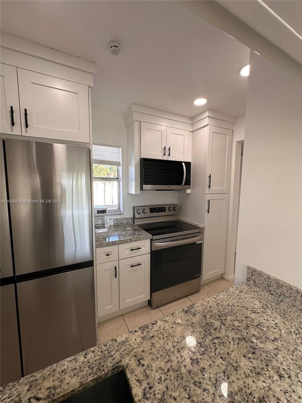 Photo of 910 Twin Lakes Dr #8-K, Coral Springs, FL 33071 (MLS # A11696854)