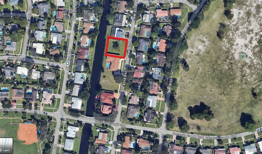 Residential vacant lot with 9000 sqft, canal front. Permits in process to build a house. More details upon request.