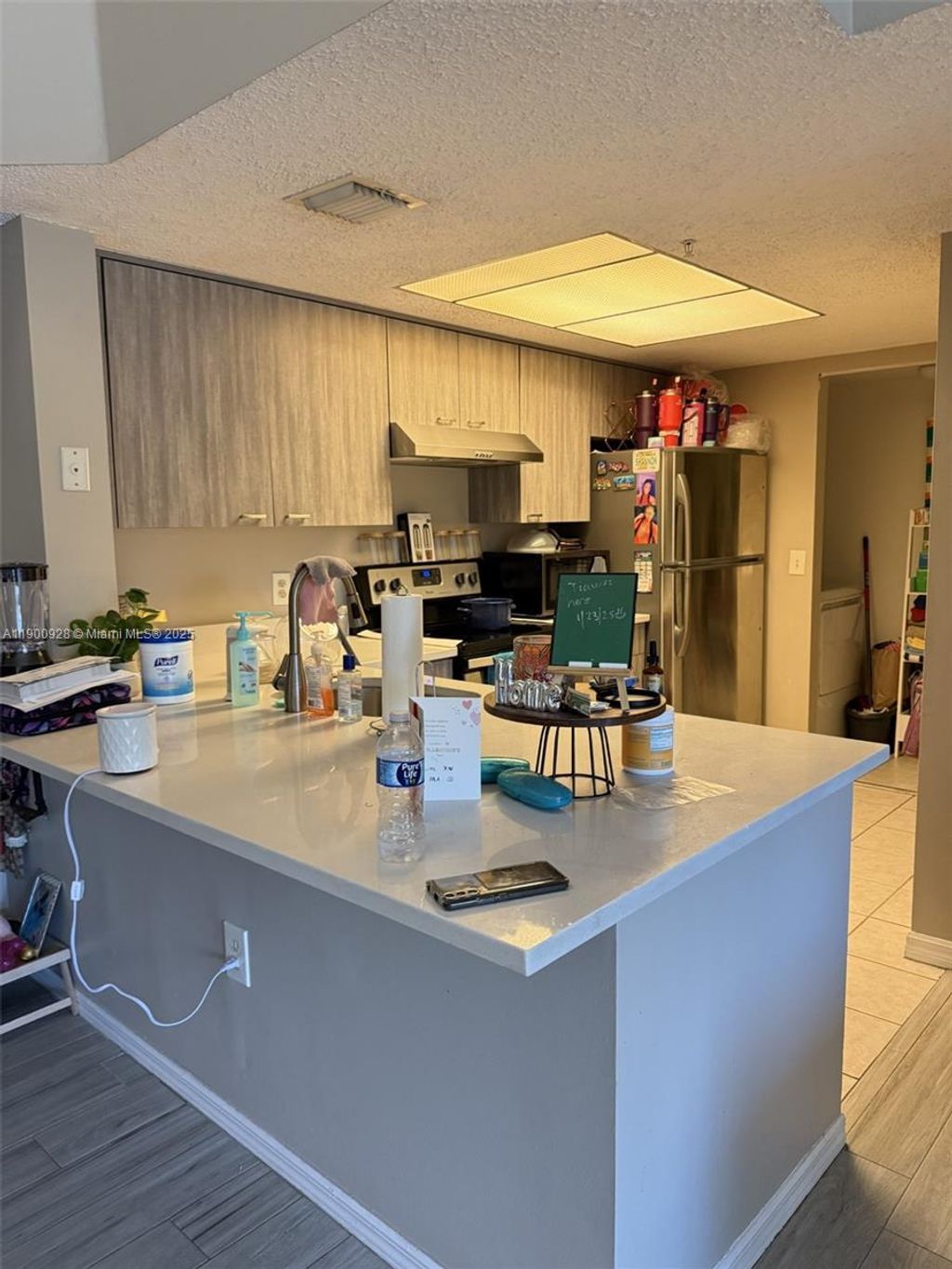 Photo of 5015 Wiles Rd #207, Coconut Creek, FL 33073 (MLS # A11900928)