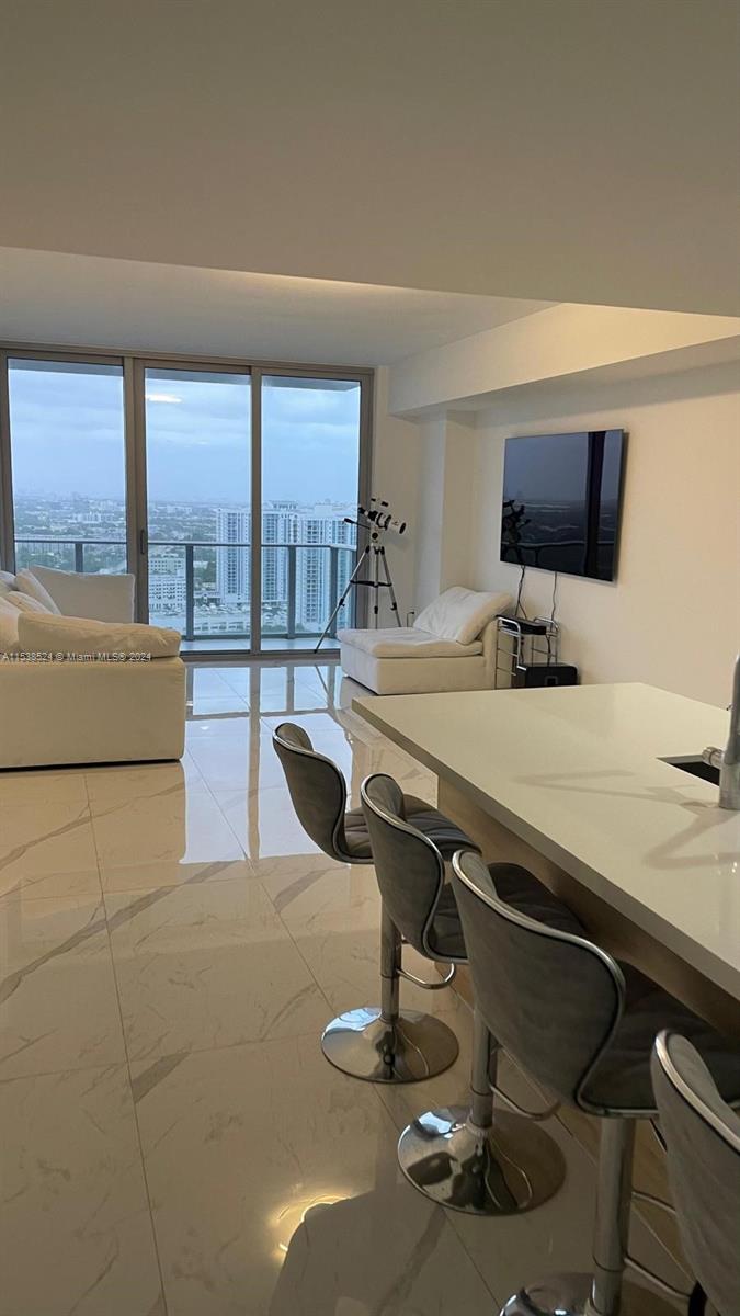 ASSUMABLE LOW INTEREST RATE LOAN-Step into luxury living with this stunning 1 bedroom, 2 bath condo nestled in the vibrant North Miami Beach area. Boasting breathtaking views of the intercoastal waters, this immaculate residence offers a blend of comfort and sophistication. The spacious bedroom provides a peaceful retreat, while the two elegantly designed bathrooms exude modern elegance and convenience.
This luxurious condo features a stylish kitchen with high-end appliances, perfect for culinary enthusiasts. The open-concept living area is ideal for entertaining guests or simply relaxing in style. With floor-to-ceiling windows that frame the picturesque views, natural light floods the space, creating a serene ambiance. Enjoy the convenience of on-site amenities.