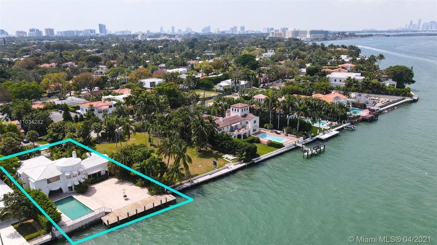 This premier waterfront estate features an unobstructed wide Biscayne bay view with one of the largest docks on Miami Beach at 16'x54' newly renovated in 2019. The expansive pool uniquely sits a little more than 1 foot from the water's edge. This is the perfect location to build your dream home or renovate the existing Art Deco jewel featuring a chef's kitchen, breakfast room, formal dining room, original keystone marble floors, a grand fireplace with a stately keystone mantle and a Great room with a Cathedral ceiling. 2 story rotunda features water views and upstairs bedroom with 20 ft. dome ceiling. Enjoy fishing, watching dolphins and manatees,  swimming in the pool, laying out in the sun, gorgeous sunsets and "Moon over Miami" views on this special piece of heaven.