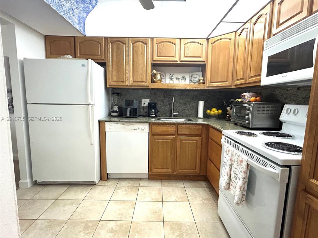 Photo of 1100 Saint Charles Pl #620, Pembroke Pines, FL 33026 (MLS # A12019795)