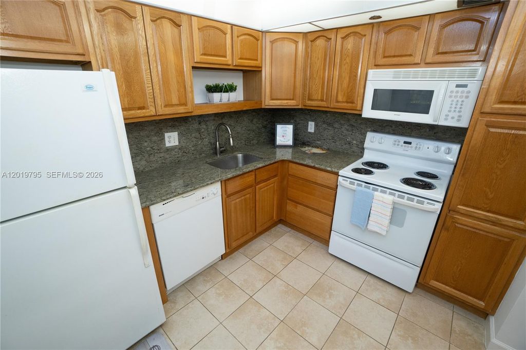 Photo of 1100 Saint Charles Pl #620, Pembroke Pines, FL 33026 (MLS # A12019795)