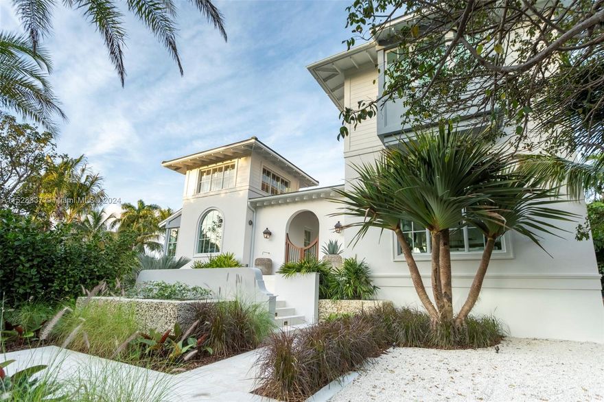 An Anglo Caribbean style 6 bedroom custom home built around an interior courtyard on oversized corner lot. Great sun exposure, brand new construction and professionally designed by James Duncan Designs.