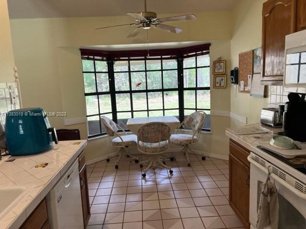 Photo of 425 SW Prater Ave, Port Saint Lucie, FL 34953 (MLS # A11383019)
