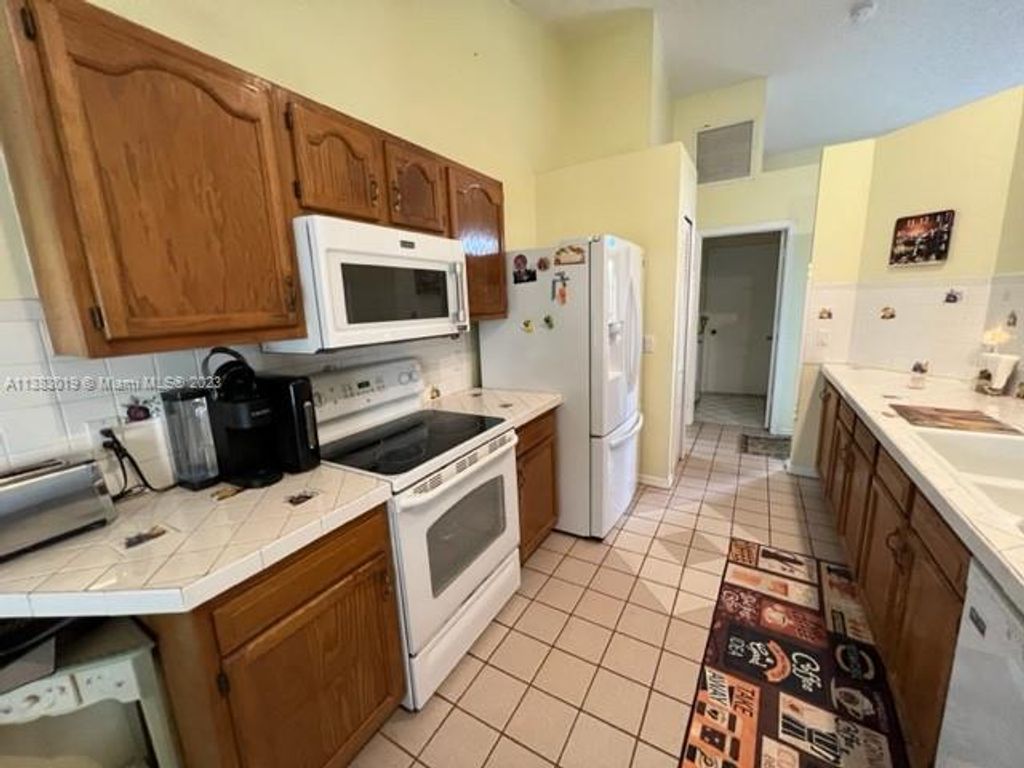 Photo of 425 SW Prater Ave, Port Saint Lucie, FL 34953 (MLS # A11383019)