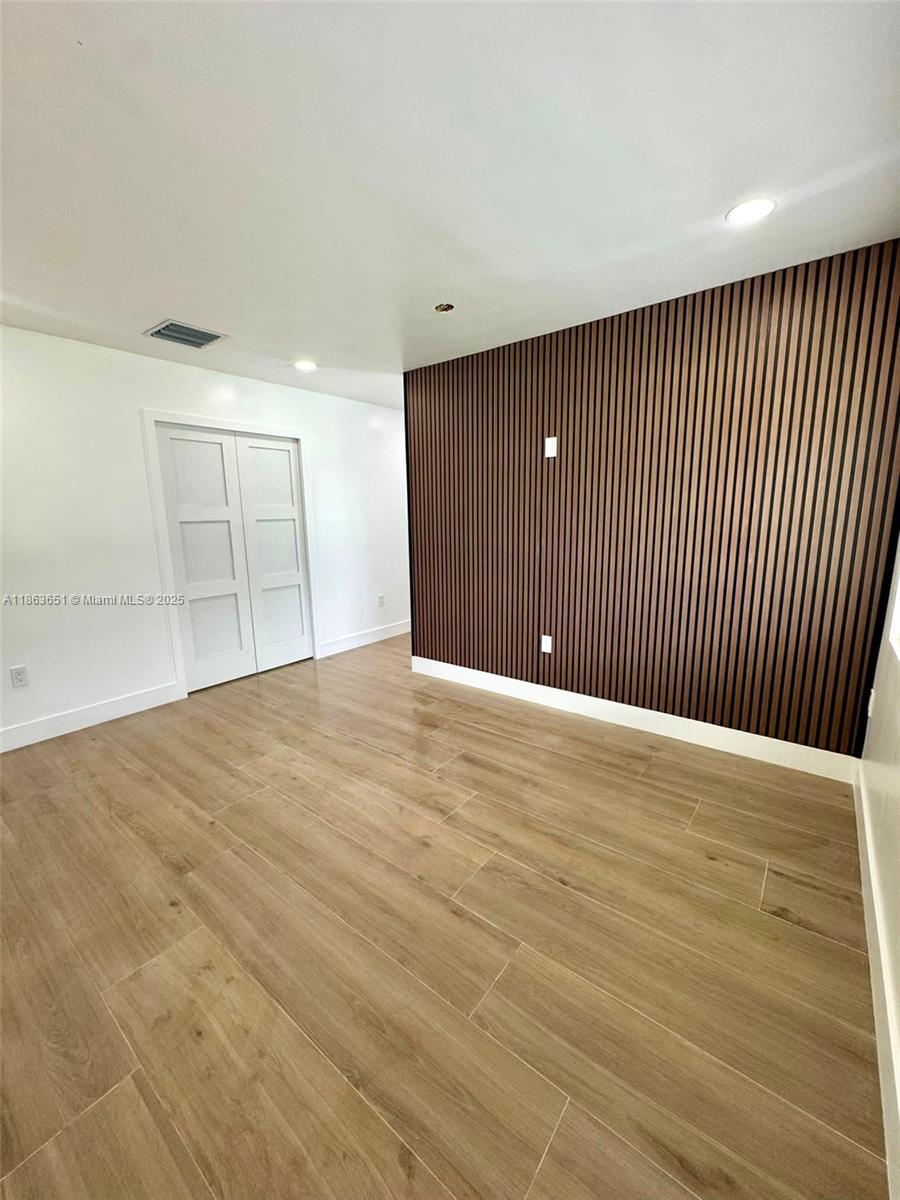 Beautiful apartment with all utilities—water, electricity, and WiFi—included for easy living. Enjoy a spacious walk-in closet, a fully equipped kitchen featuring refrigerator, stove, and microwave, plus the convenience of a private entrance and your own patio area. Two dedicated parking spots add to the comfort, and a brand-new washer and dryer will soon be installed in the unit. One small pet is welcome, making this a perfect blend of function and comfort.