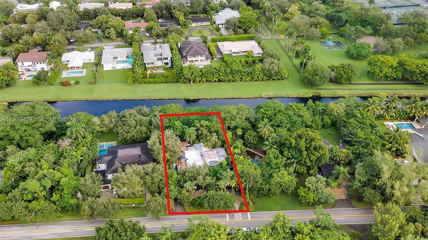 Wonderful generational residence with around 3,500 sf of construction and a lot with over 12,630 sf. Enjoy beautiful sunsets with a backdrop of Snapper Creek Canal covered by large mature trees. The lot has a part in prestigious South Miami and another in sought-after Pinecrest. The house was originally designed with two interconnected homes: a 3/2 and a 3/3. 
Great location only a few minutes away from the famous shops and restaurants of South Miami and a few more minutes to Dadeland Mall. If you like the ocean, the Hammock Park Marina and park is only 15 minutes away.
Area surrounded by excellent public and private schools and beautiful parks.
