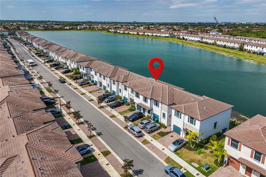 Welcome to this stunning 4-bedroom, 3.5-bathroom townhouse built in 2022, offering modern comfort and convenience in a family-friendly neighborhood. This smart home features an open-concept layout, a spacious kitchen, and a bright living area with beautiful natural light. Enjoy breathtaking lake views from your backyard, perfect for relaxing or entertaining. The attached garage provides secure parking and additional storage. Plus, enjoy access to a dog park, making it a great community for pet lovers!