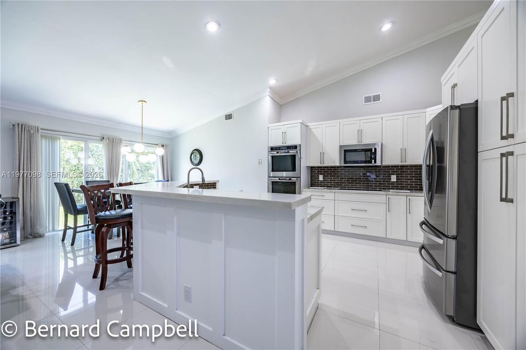 Photo of 1210 NW 193rd Ave, Pembroke Pines, FL 33029 (MLS # A11977098)