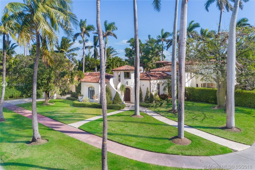 Unique Mediterranean/Spanish villa situated on an oversized 18,088-sf corner lot on prestigious North Bay Road. This stunning home has been expanded in 2005, but has kept its magnificent architectural features & incredible curb appeal. The living areas consist of living room with original 1931 cathedral beamed ceilings & mantel stone fireplace, family room with groin vaulted ceilings, formal dining, & eat-in kitchen with SubZero/Viking/Miele appl. All living areas are overlooking the lush backyard featuring a pool, summer kitchen, & outdoor shower. Upstairs, master bed with bath with steam shower, vanity station, 2 walk-in closets, & private terrace. Finishes include impact glass Mahogany doors/windows, rustic stone floors, mosaic tile & onyx baths. This villa has been designated historic.