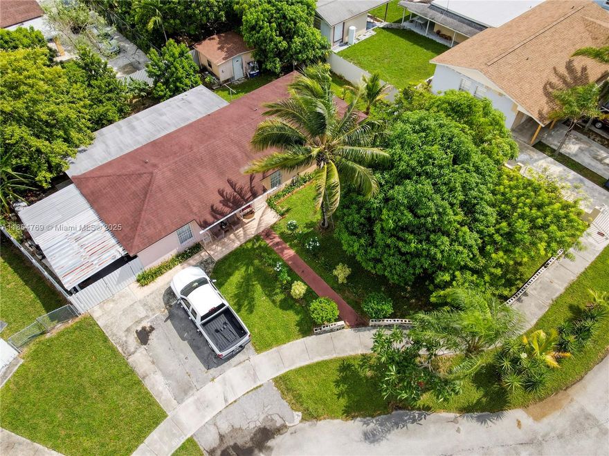 Over 2100 sq ft of living space! 4-bedroom, 2-bath single-family home with no HOA. located on a quiet cul-de-sac. Lot is 8,750 sq ft. New roof installed in 2018, new A/C from 2019, and a new water heater provide peace of mind for years to come. Each bedroom offers a walk-in closet which is rare. The updated kitchen features stainless steel appliances and a washer/dryer in a dedicated laundry room. The large family room provides plenty of space for gatherings, and dual central A/C units allow for comfort and efficiency. Enjoy a fenced backyard with mature fruit trees including mango plantain and more. Also includes a storage shed and covered deck with space for a vehicle in your yard. Drive way fits multiple cars. Near schools, shopping, restaurants, and the Turnpike for easy commuting.