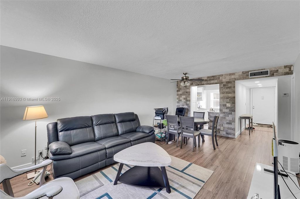 Photo of 8405 NW 61st St #D207, Tamarac, FL 33321 (MLS # A11916993)