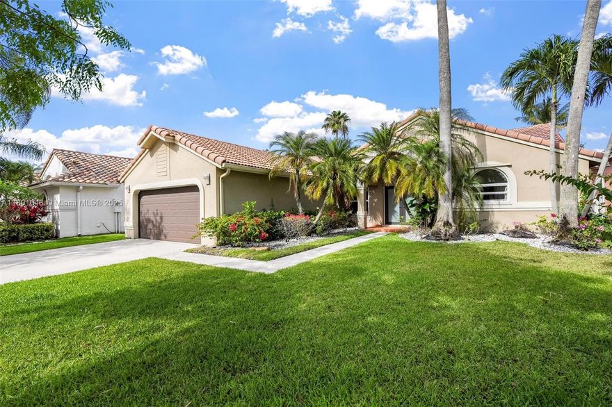 Beautifully updated 5BD/3BA one-story home in the highly desirable 24-hr gated community of The Lakes in
Weston. Ideally located across from a charming park, this home features a bright, open layout with natural light
throughout. Renovated kitchen with stainless steel appliances and completely remodeled bathrooms, including a
stunning primary suite. Recessed lighting, smooth ceilings, and updated flooring throughout. Enjoy the spacious
backyard with pool, new wood deck, and updated patio area. Newer AC, water heater, washer/dryer, and
refrigerator. Hurricane protection includes mix of shutters and impact windows. Home includes a permitted
addition—larger than original model. Zoned for A+ rated schools.