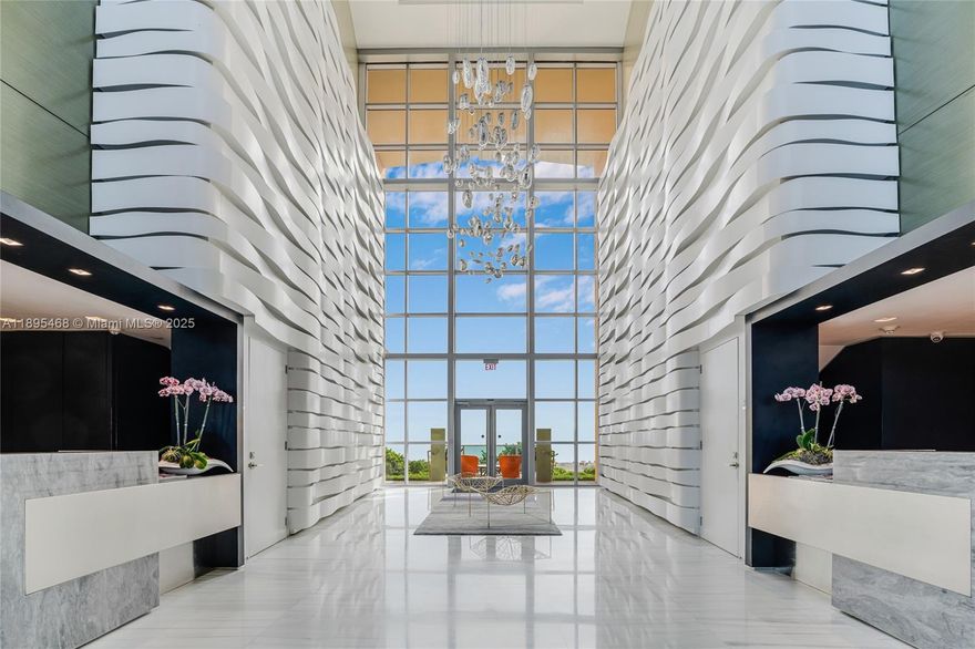 IL Villaggio stands as one of Miami Beach’s most prestigious boutique condominiums, designed by renowned architect Luis Revuelta. Residence at IL Villaggio showcases sweeping views of the Atlantic Ocean and a pristine white sandy beach through floor-to-ceiling windows in every room, opening onto expansive four hundred and eighty-two square feet terrace. This residence creates a serene retreat, which is both relaxing and perfect for entertaining, above the vibrant South Beach neighborhood. The residence gives the ideal balance of privacy and resort-style living, featuring 2 split bedrooms, 3 and a half bathrooms, and a versatile extra room perfect as a guest suite, den, or home office.