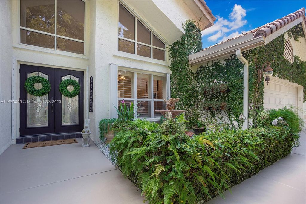 Photo of 4710 Chardonnay Dr, Coral Springs, FL 33067 (MLS # A11476555)