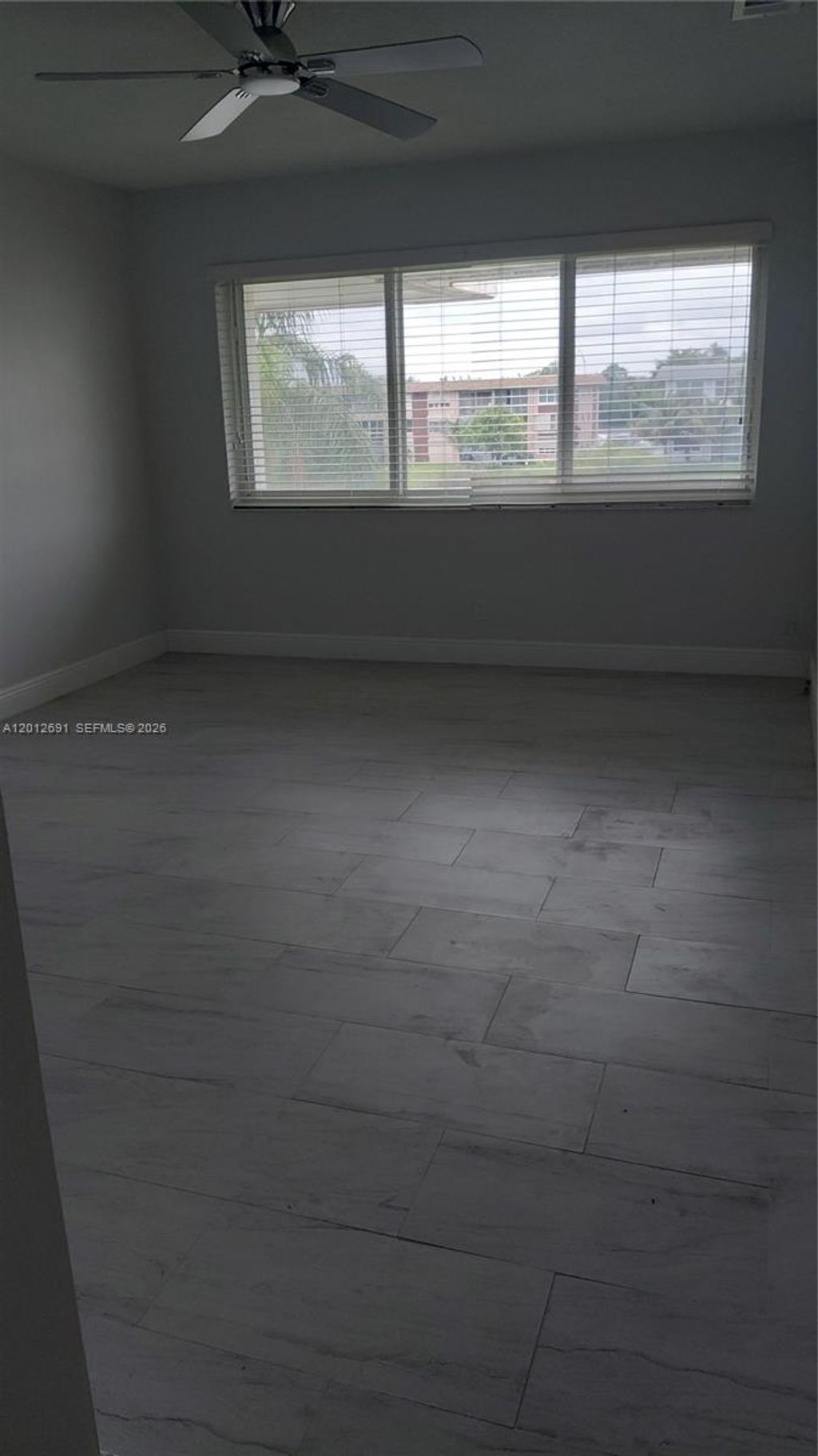 Photo of 5480 NW 11th St #306, Plantation, FL 33313 (MLS # A12012691)