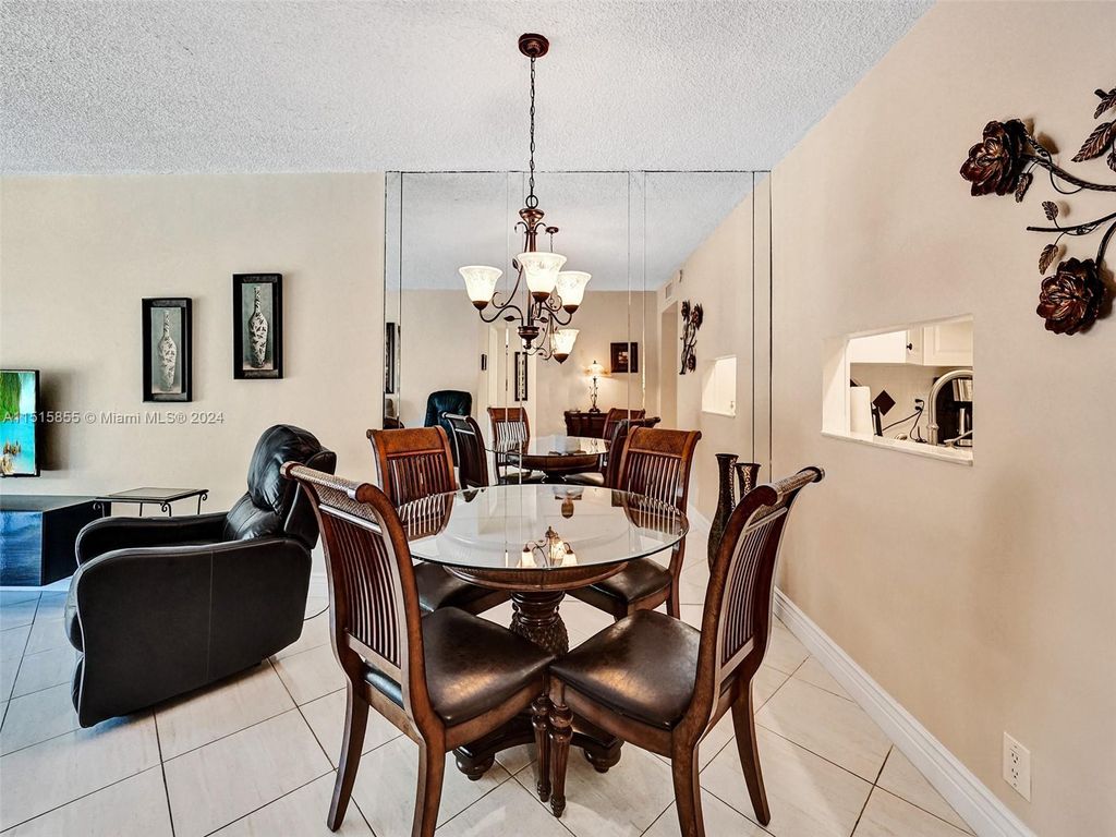 Photo of 1200 Hillcrest Ct #202, Hollywood, FL 33021 (MLS # A11515855)