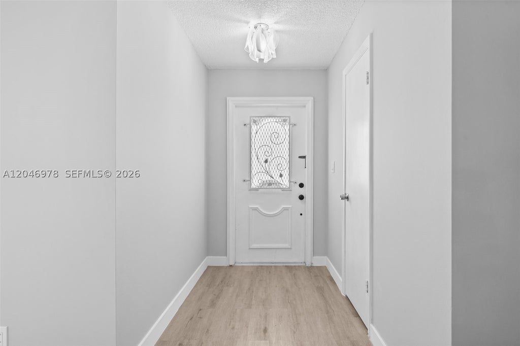Photo of 2408 NE 10th St #122, Hallandale Beach, FL 33009 (MLS # A12046978)
