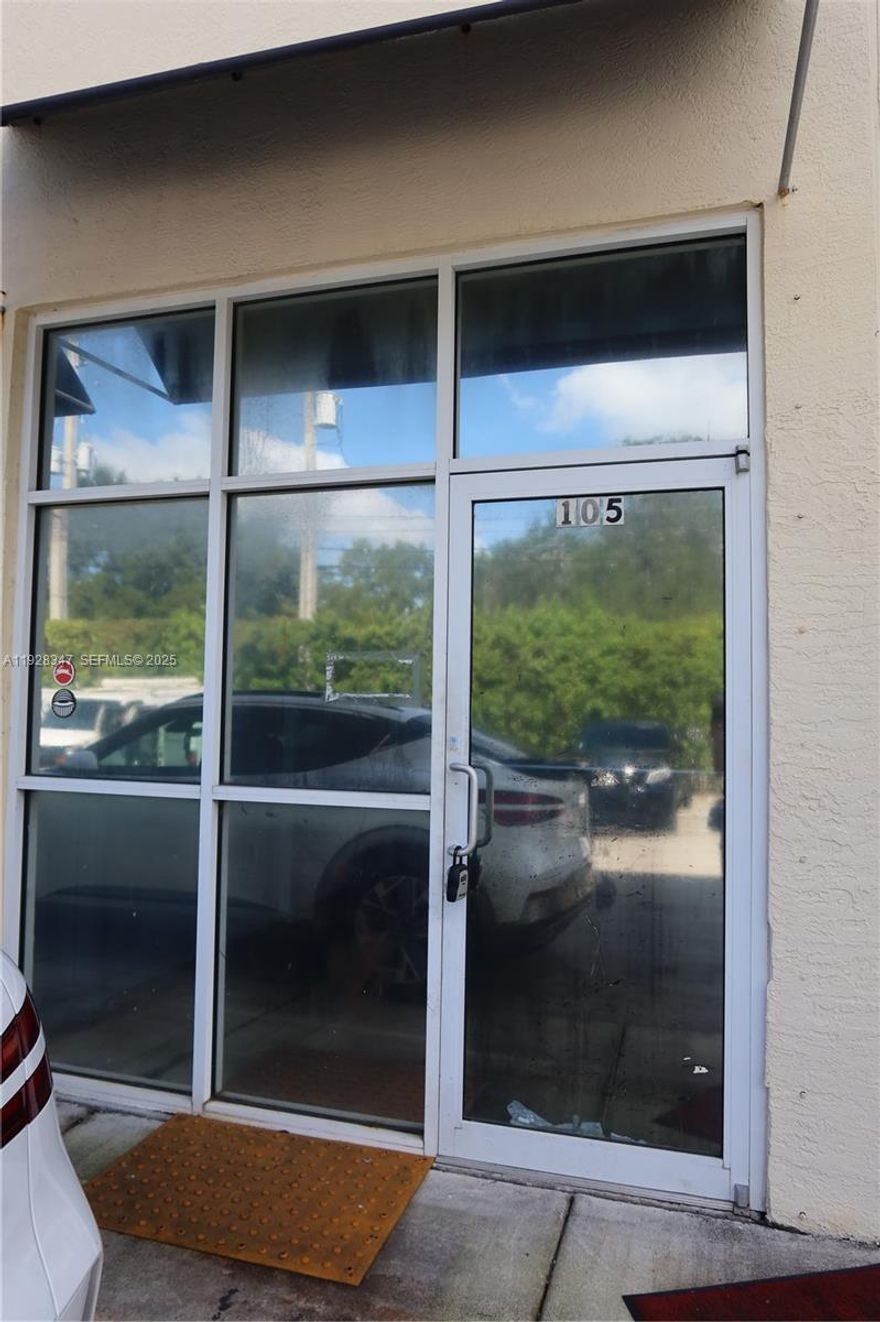 Introducing a prime opportunity to secure a highly versatile 2,005 SF industrial condo in one of Miami’s most strategically located commercial corridors. This well-appointed warehouse unit offers an exceptional blend of functional workspace and office potential, ideal for a wide range of business operations—from distribution and storage to creative or service-based uses.

The property features a street-level, front-facing loading door with excellent visibility and a 20’ clear ceiling height, providing efficient flow for equipment, vehicles, and inventory. Two interior car lifts, included in the sale, offer added utility for automotive or mechanical businesses. A dedicated entry leads directly into the office area, ensuring smooth separation between administrative and warehouse functions.

Positioned just minutes from Aventura, Bal Harbour, Biscayne Park, and Miami Shores, the location offers unparalleled convenience with quick access to I-95 and Biscayne Blvd—perfect for companies prioritizing connectivity and logistics.

Whether you’re an end-user aiming to establish or expand your business presence, or an investor seeking a high-demand industrial asset, this property represents a rare chance to acquire a well-located warehouse in a market where opportunities of this caliber seldom become available.

Monthly Maintenance $972