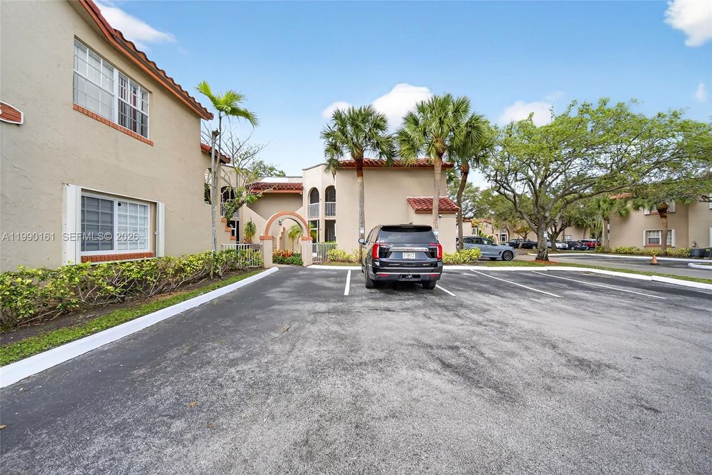 Photo of 365 SW 86th Ave #201, Pembroke Pines, FL 33025 (MLS # A11990161)