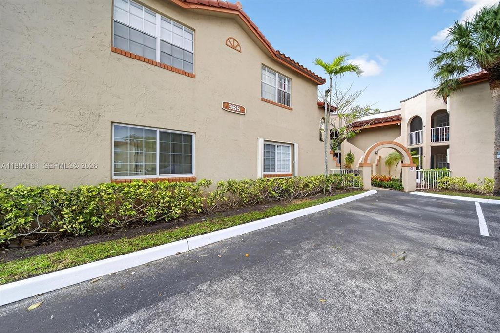 Photo of 365 SW 86th Ave #201, Pembroke Pines, FL 33025 (MLS # A11990161)