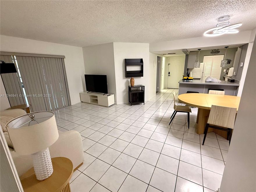 Welcome to your Miami oasis at 20741 Northeast 4th Court, Unit 104! This delightful 2-bedroom, 2-bathroom condo offers a perfect blend of comfort and style across 917 square feet. Step into the open kitchen, where culinary adventures await, and enjoy the convenience of an in-unit washer and dryer. The primary bedroom boasts a walk-in closet, ideal for your fashion collection. Sip your morning coffee on the private balcony or take a dip in the community pool. With assigned and guest parking, your visitors will always feel welcome. Nestled in a gated community with a low-rise charm, this home also features a garage and access to a common media/recreation room. Air conditioning? Of course! Your Miami lifestyle begins here—schedule a tour today!