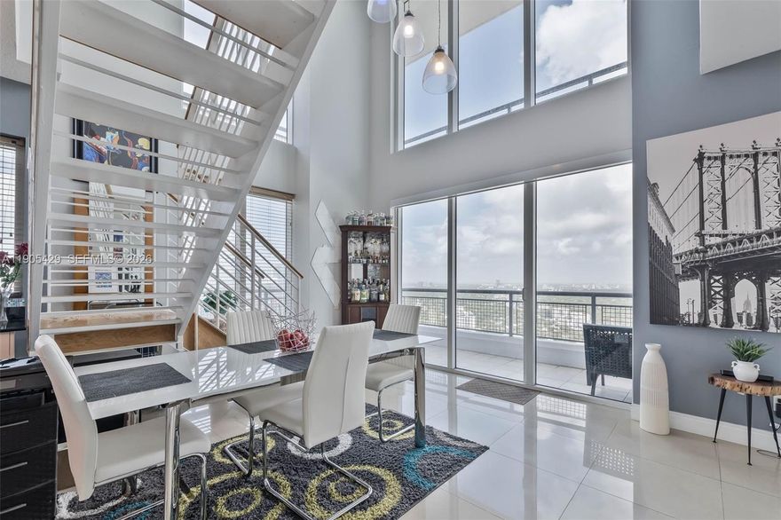 Fantastic Miami location in desirable Brickell area. This dramatic two-story corner residence, a highly sought-after "01" line, offers breathtaking views. This seldom available line is special. It's roomy and light filled - one of the best that the infinity building has to offer. You'll love the wonderful feeling, the layout and balcony areas. Ready to move in! Dramatic 34th floor with two large, stacked corner balconies offer incredible outdoor space. Enjoy the peace of mind that comes with a home carefully maintained by its owner. A very nice den or 3rd bedroom is easily possible to create. With a window/door. There is a full bathroom on the 1st level..adjacent to this area. The flooring is beautiful both upstairs and downstairs. Only 7 miles to the Miami Intl Airport. Flexible rental availability, 30 days to rent out. Miami's Brickell area is hot!