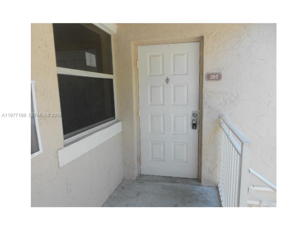 Photo of 11216 SW 12th St #203, Pembroke Pines, FL 33025 (MLS # A11977199)