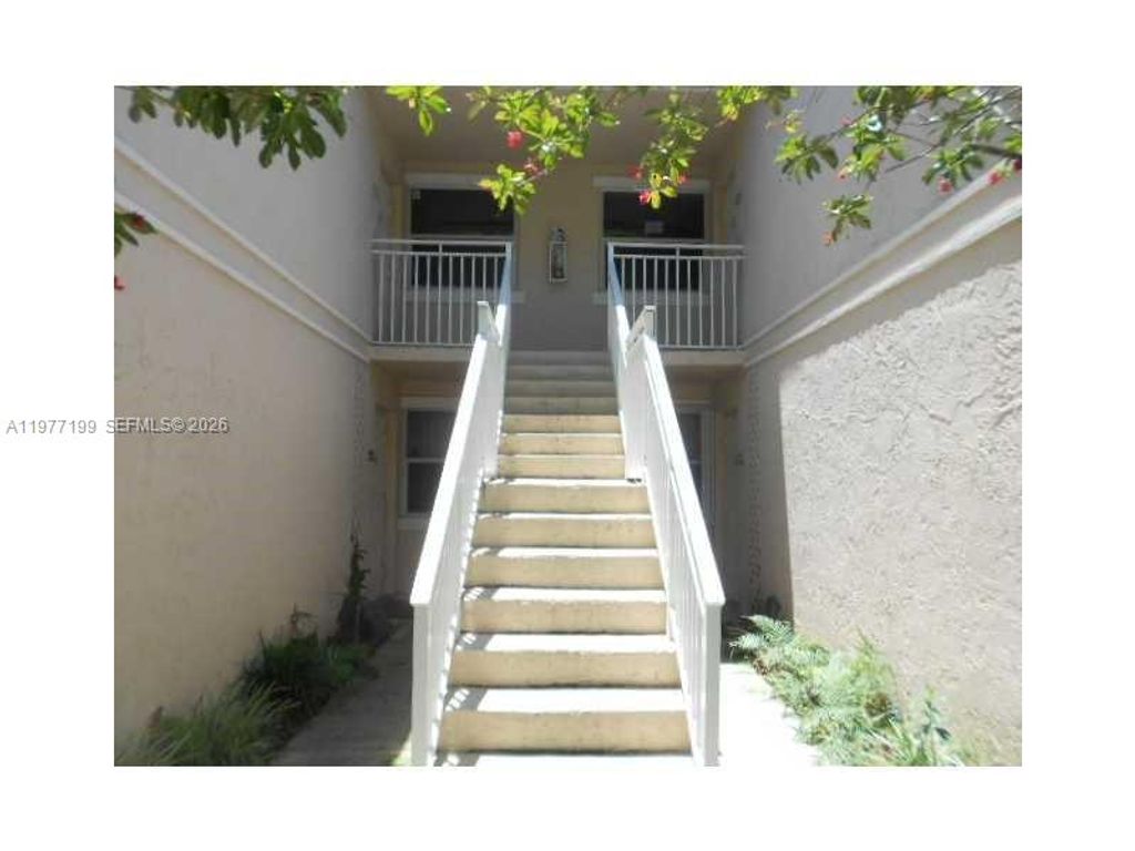 Photo of 11216 SW 12th St #203, Pembroke Pines, FL 33025 (MLS # A11977199)