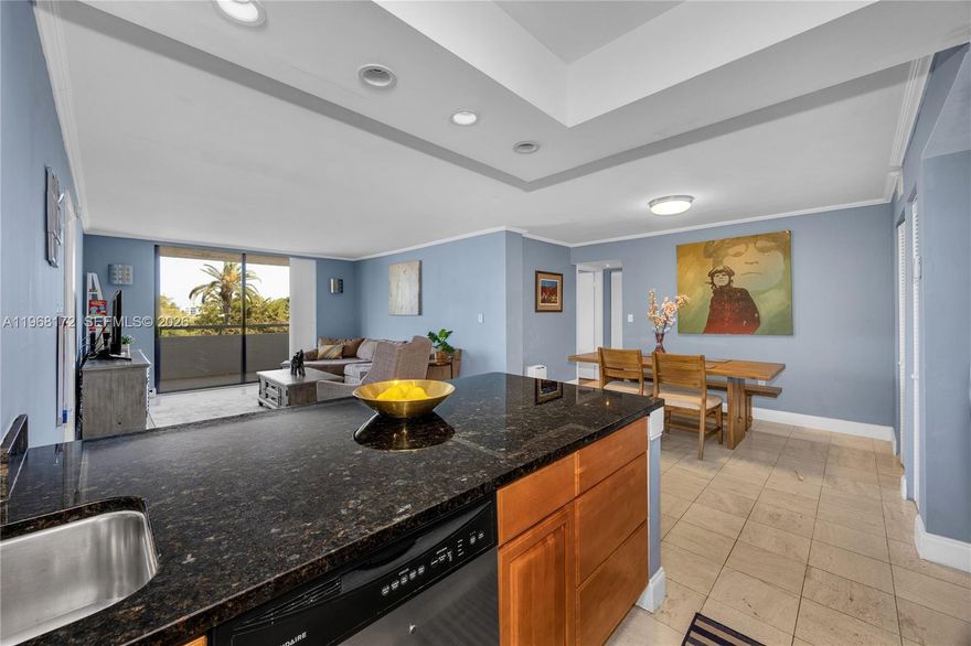 This well-designed 2-bedroom, 2-bath condo offers 1,073 sq ft of thoughtfully used living space with a desirable split floor plan for privacy and functionality. Impact windows and doors, a tankless water heater, marble floors, and travertine bathrooms elevate the home’s modern feel, while the open kitchen features granite countertops and stainless steel appliances. 

The primary suite includes a walk-in closet and a built-in office desk—ideal for remote work. Enjoy a spacious open balcony, perfect for relaxing or entertaining. Additional features include extra storage, a covered parking space (second space available for rent), guest parking, and residential street parking.

The building passed its 40-year inspection in 2020 and has completed SIRS. Maintenance includes WiFi and cable, and laundry rooms are conveniently located on each floor. Residents enjoy an on-site pool and a quiet residential setting.

Located within walking distance to Normandy Isle’s shops and restaurants, and less than a 10-minute drive to South Beach and Bal Harbour, this condo offers excellent value for full-time residents, second-home buyers, or investors.