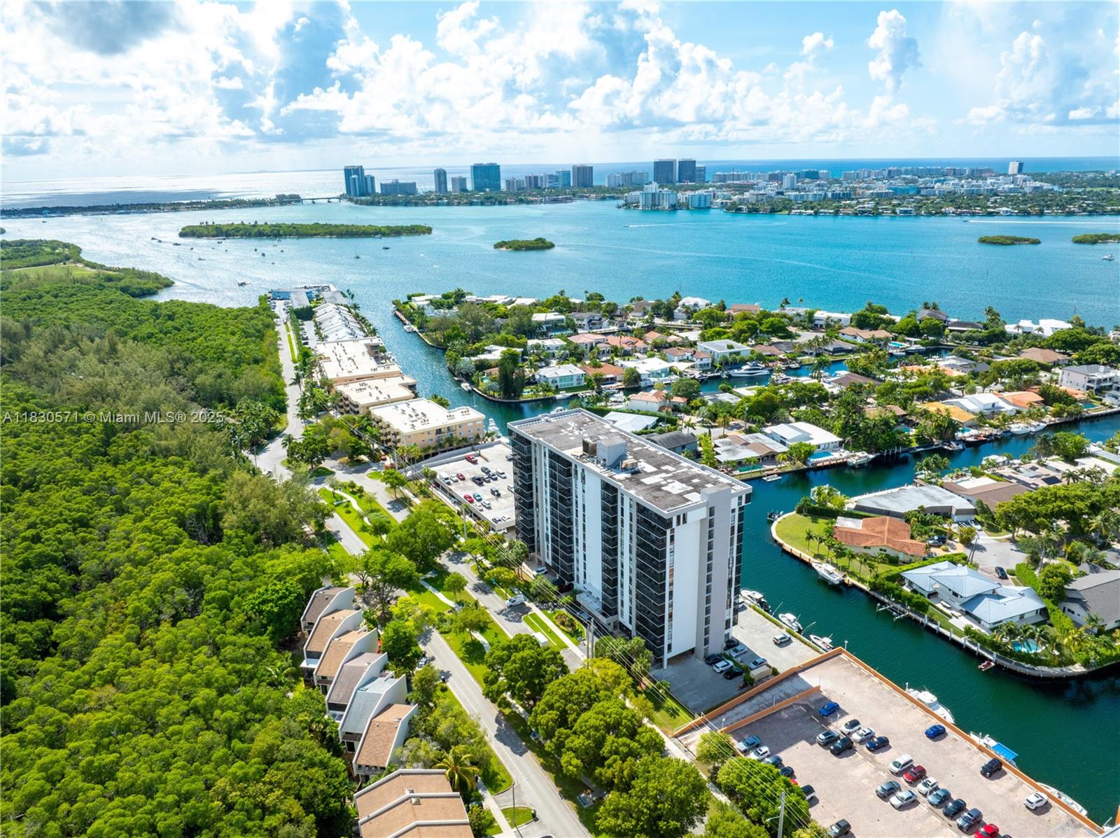 Enjoy the breathtaking views from this corner unit, spacious 2 beds 2 baths, with a lot of natural light, huge balcony, spectacular views to Arch East Creek preserve, Miami Skyline, incredible sunset views. Don't miss out on this fantastic opportunity to make this your dream home. Boat lovers, this is your place, with no fixed bridges and just a few minutes to open ocean, boat dock is available to rent by the association, with 1 assigned parking space, plus guest parking. Dorset House has an excellent location east of Biscayne Blvd. on a cul-de-sac, a very scenic street, bike paths, dog walking, and nearby Arch East Creek Nature Preserve and just minutes away from the pristine beach, shopping, and dining.