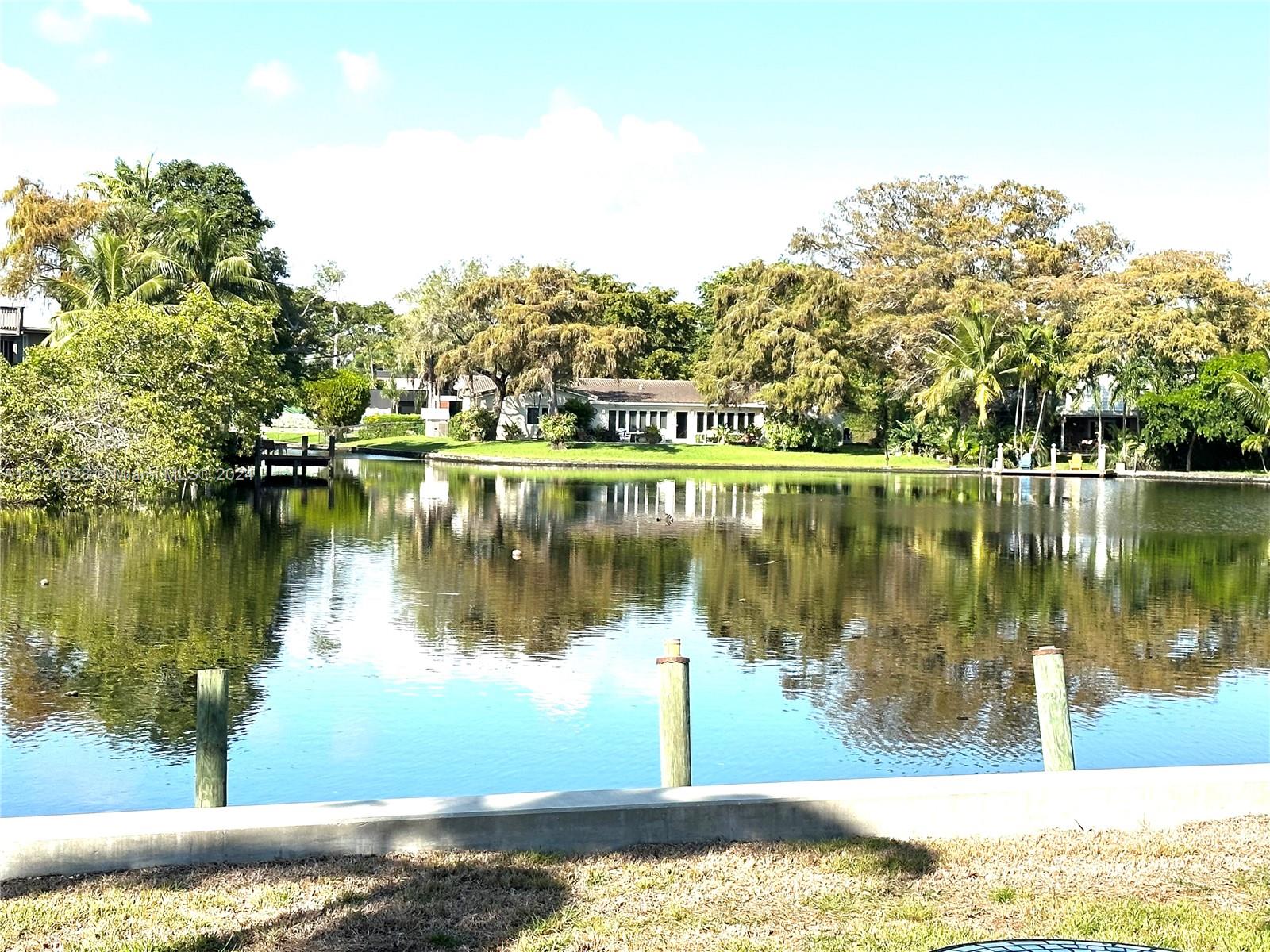 Direct views of Middle River! 1 bed 1 bath condo in a boutique waterfront building overlooking the water in Fort Lauderdale. TOTALLY Upgraded condo with granite countertops, stainless appliances, modern wood plank flooring throughout! New LG WASHER AND DRYER inside. No expense spared. No Dogs. Community pool. Close to Wilton Drive! Easy to Show!
