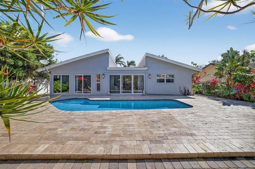 If mid-century modern is your vibe, bring your tribe! This light and bright, updated, move-in ready home offers peace of mind with impact windows and doors, and a brand new roof to be completed prior to closing. Enjoy your backyard zen oasis complete with a sparkling saltwater pool and low maintenance, but lush and fragrant landscaping. No HOA! Across the street from Coco Point Park, close to the ever growing Promenade at Coconut Creek, and situated conveniently close to the turnpike for your morning commute.