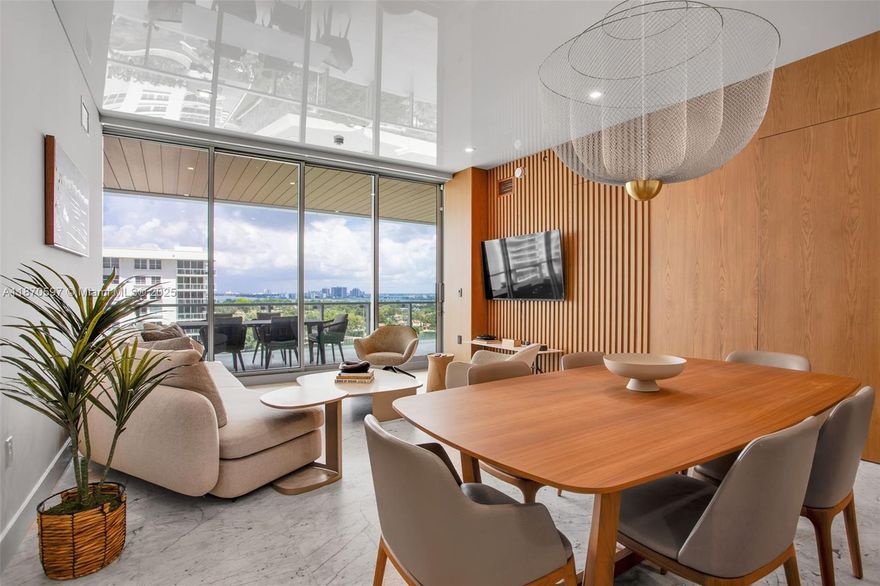 Set above Miami Beach’s iconic Millionaire’s Row, residence 1105 at 57 Ocean offers a refined blend of natural warmth and modern sophistication. This 2-bedroom, 2.5-bath residence features a private elevator entry, a thoughtfully designed layout with wood and marble flooring, custom closets, a sleek open kitchen, and spa-inspired baths with premium finishes. Floor-to-ceiling multi-panel sliding doors allow each living space to blend with its accommodating west-facing terrace—perfect for enjoying soft bay breezes, golden sunsets, and seamless indoor-outdoor living. Residents also enjoy world-class amenities including beachfront pools, a serene wellness spa, open-air fitness pavilion,
library lounge, club room, and attentive 24-hour concierge service. Coastal luxury, redefined.