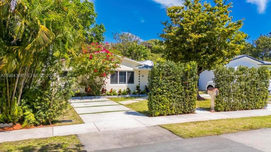 Fully renovated charming beach cottage in Dania Beach just minutes from the ocean and the Hollywood Beach Boardwalk. This move-in ready 3 bedroom, 2 bathroom home sits on an oversized 7,252 sq ft fenced lot with a private backyard and room for a pool, perfect for creating your own tropical oasis or entertaining. Enjoy a bright open floor plan with elegant porcelain flooring, impact windows, and a newer roof for peace of mind. The updated kitchen features white shaker cabinets, Bosch stainless steel appliances, and modern finishes, while both bathrooms offer spa-style walk-in showers.This home is equipped with a premium sound experience including 7.2 in-ceiling and in-wall Bowers and Wilkins home theater speakers and a 9-zone Sonos system throughout. Additional highlights include newer AC, tankless water heater, Tesla charger, auto irrigation system with well, two driveways with parking for up to 3 cars, and a large storage shed. Ideally suited as a primary residence, vacation home, or investment property. Minutes to Dania Beach, the Hollywood Beach Boardwalk, and close to the new Dania Pointe shopping and entertainment plaza, plus dining, shopping, and major highways. A must see in person.