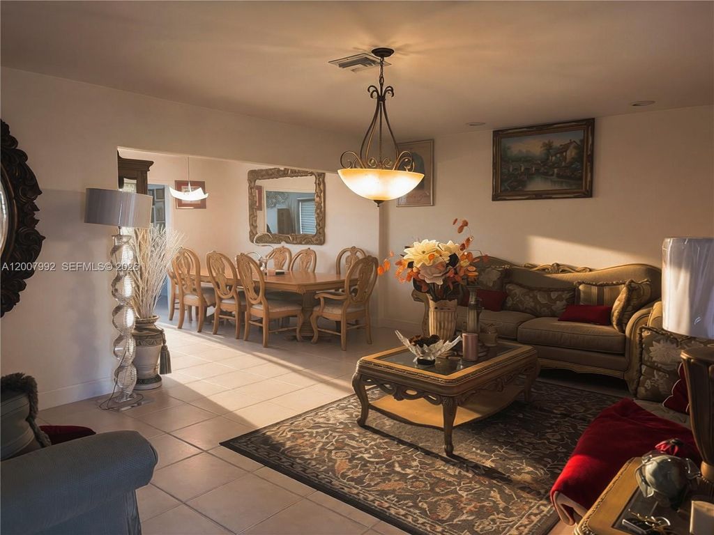 Photo of 5306 Roosevelt St, Hollywood, FL 33021 (MLS # A12007992)