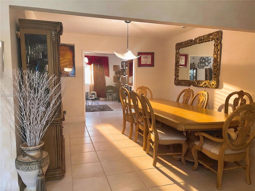 Photo of 5306 Roosevelt St, Hollywood, FL 33021 (MLS # A12007992)