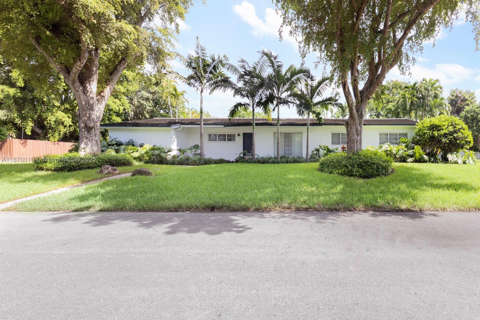 Beautifully updated 4-bed, 3-bath home on a 16,000+ sq ft lot in prime Pinecrest. This light-filled residence features a split-bedroom layout, two spacious family rooms, formal dining, and an open kitchen with quartz counters and stainless appliances. All bathrooms have been tastefully renovated with modern finishes. Impact windows and doors offer peace of mind and energy efficiency. The lush backyard is a private retreat with a large pool and patio, ideal for entertaining. Located on a quiet, tree-lined street just minutes from top-rated schools, parks, and shopping. A perfect blend of comfort, style, and location in one of Miami’s most sought-after neighborhoods. Move-in ready and full of charm