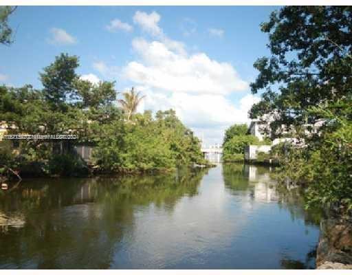 WATERFRONT LOT with direct access to the bay, featuring one bridge with ample clearance for a bowrider or similar boat without fixed overhead restrictions. Previous rights to an approximately 3,000 sq ft home will be transferred, potentially reducing your building fees. The property is zoned for Single Family + ADU (Accessory Dwelling Unit), offering versatile options for your new build.
Owner financing available with rates as low as 4% for qualified buyers!