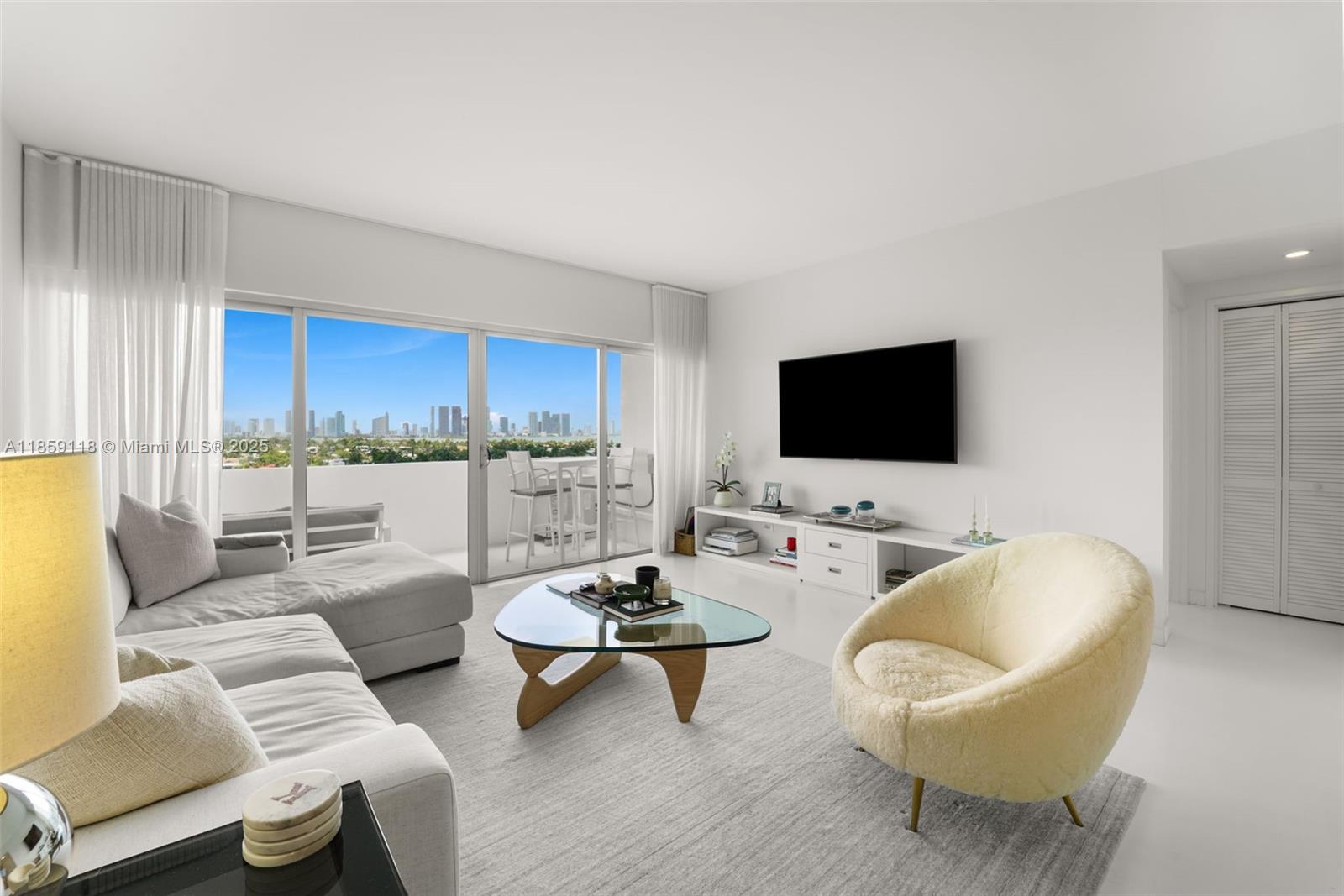 Presenting 3 Island Avenue 11G on Belle Isle. "Architectural Digest" quality renovation with no detail overlooked. This high floor unit offers Million Dollar views of Biscayne Bay and the Miami skyline & the most spectacular sunsets from every room. Sleek Italian custom kitchen with high end appliances. Brand new impact doors and windows (complete wall of windows 4 panels not a partial 3 panel view). Private Balcony with amazing views. The building was designed by renowned architect Morris Lapidus. This mid-century gem is the perfect blend of luxury, style and timeless design.