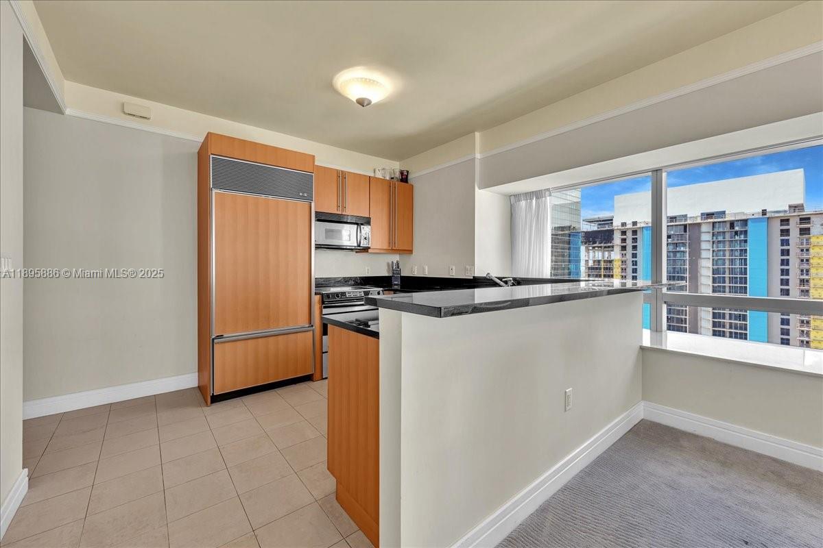MILLENNIUM TOWER CONDOMIN - Residential